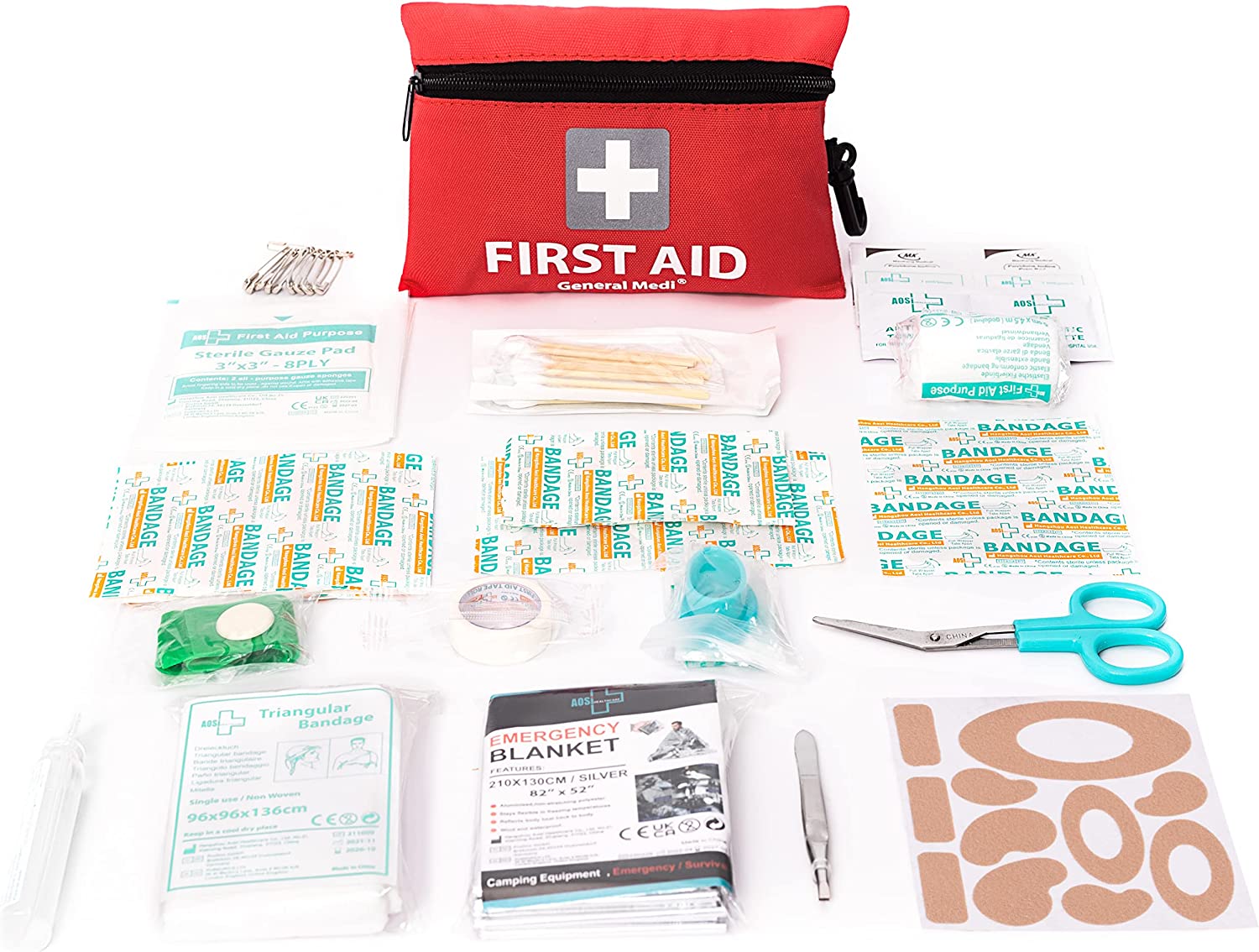 Contents of mini aid kit, laid out on a white background
